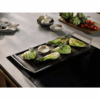 Grillen van groenten op grillplaat boven de Electrolux EIS87553IZ inductiekookplaat