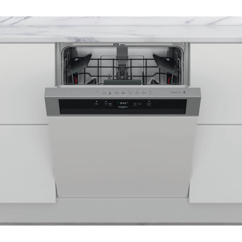 Vooraanzicht van Whirlpool WB 6020 P X in moderne keuken met deels geopende deur