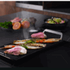 Grillen van vis en groenten op de AEG CN071436DH kookplaat met grillplaat