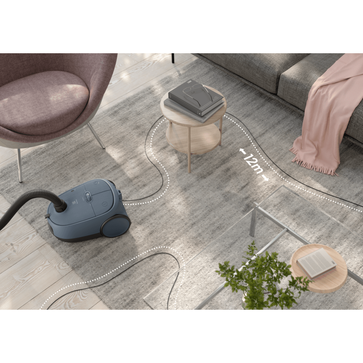 Electrolux EB61C2DBP – actieradius van 12 meter getoond in woonkamer op vloerkleed
