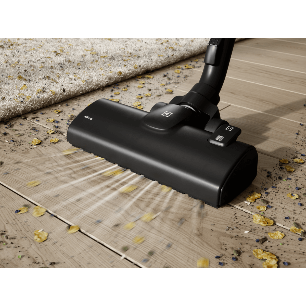 Electrolux EB51C1SW stofzuiger zuigmond verwijdert vuil en kruimels effectief van houten vloer en tapijt.
