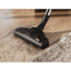 CombiFloor-mondstuk van de Electrolux EL31C2OG in gebruik op houten vloer met vuil