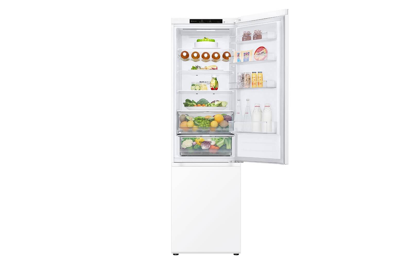 LG GBV3200DSW koelkast open, gevuld met verse groenten, fruit en flessen melk