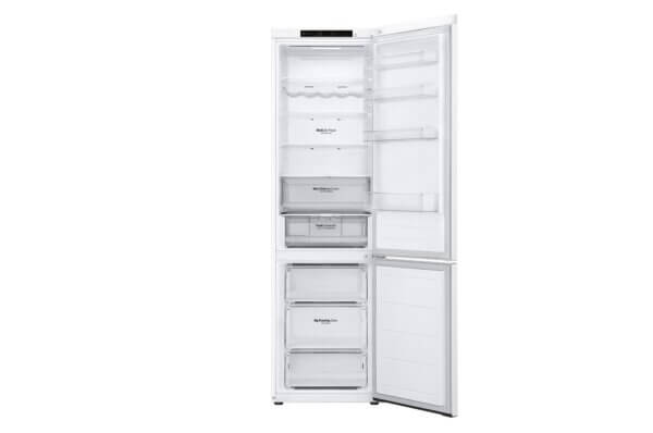 LG GBV3200DSW koelkast volledig open, met lege schappen en vriesladen